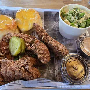 Tenders, biscuits, loaded potato salad, &amp; sauces