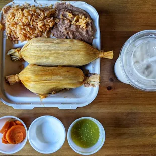 Two Tamales Meal Combo: two tamales, vegan Mexican rice, refried pinto beans, and small containers of salsa, sour cream &amp; pickled veggies