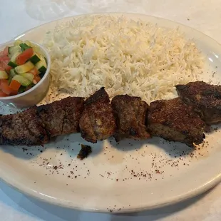 a side of rice and a salad