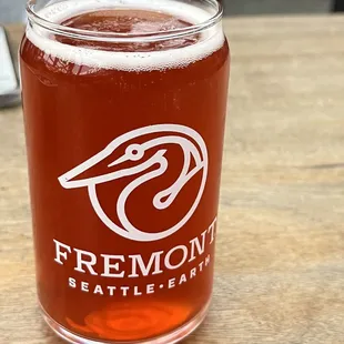 a glass of beer on a table