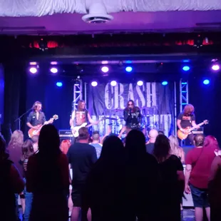 a band performing on stage