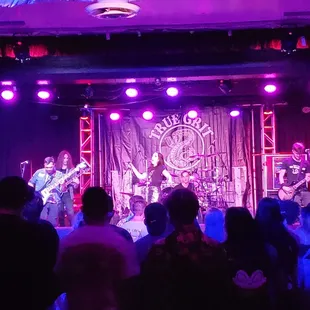 a band performing on stage
