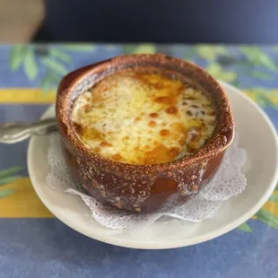 a bowl of soup on a plate