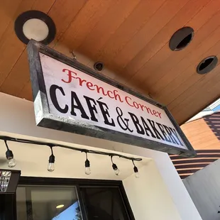 a sign for a cafe and bakery