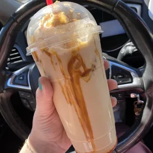 Large Iced Caramel Latte with whip and caramel drizzle!
