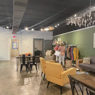 two people in a clothing store