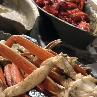 Boat of crawfish and boat of snow crab