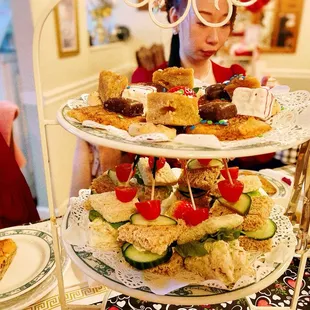 three tiered trays of food