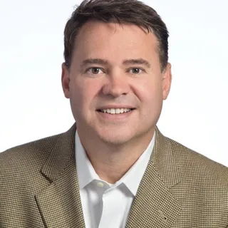 Scott T.