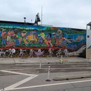 Mural on the flood wall at the back of the market