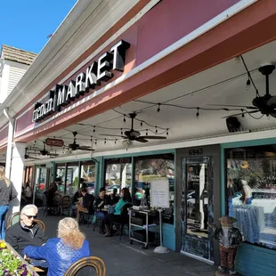 the outside of a french market