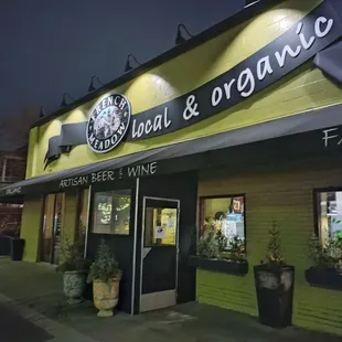 Front signage and entrance. Small parking lot to the right with plenty of off street space.