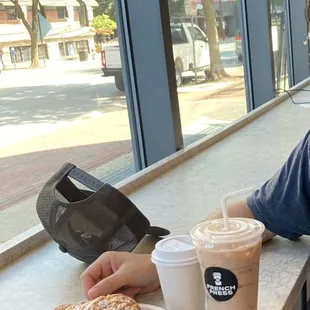 Flat white, iced chai latte, almond croissant, spinach quiche