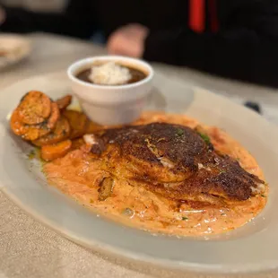 Stuffed Catfish, sautéed carrots, red beans and rice