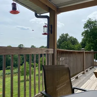 a patio with a table and chairs