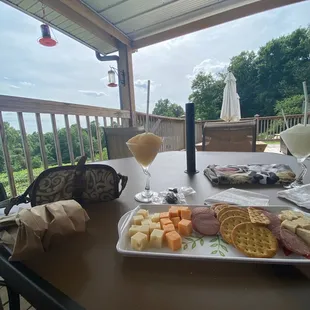 a tray of food on a patio table
