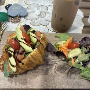 Smoked salmon croissant sandwich with an iced coffee!