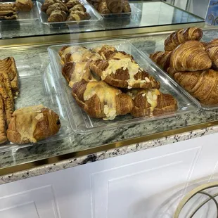 Almond croissant and pistachio raspberry croissant