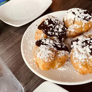 Chocolate sauce beignets