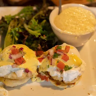 Crab Cakes Benedict: Maryland Crab Cakes, Poached Eggs, Hollandaise Sauce, Pico De Gallo, House Hash or Grits, Mixed Greens
