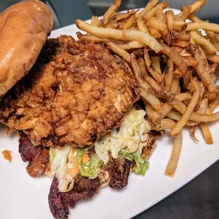 Yum! Large, juicy, fried chicken sandwich with coleslaw, pickle spear, and tons of fries. Unfortunately the bacon was as tough as jerky.