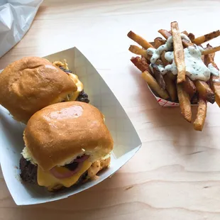 two burgers and fries