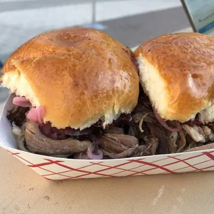 two pulled pork sandwiches