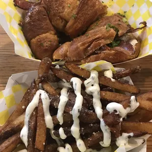 Grilled cheese sandwich with bacon on a croissant and French fries! At the Pythian market!