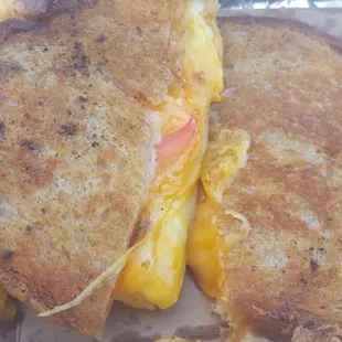 Huge and delicious "Bootz" (Swiss, Colby and Cheddar) add tomatoes $7.00.