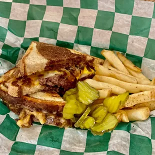 This months #botm "The Scotty Melt"! Burger, American and Swiss Cheese w/Caramelized Onion and Thousand Island Dressing!