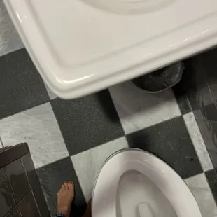 Toilet proximity to sink and wall where door closed - directly behind sink. It was TIGHT!!