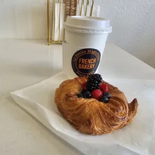 cappuccino $4.95 croissant with fruit $5.25