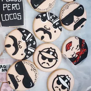 decorated cookies with black and white designs