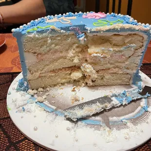 Inside of the cake. The layers weren't leveled with hardly any filling. The filling tasted like a light whipped cream, no strawberry