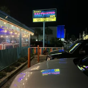 a car parked in front of the restaurant