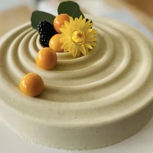 a cake with a flower on top