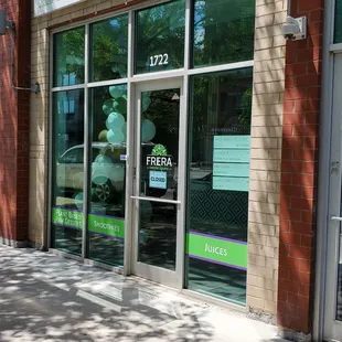 the front of a store on a sunny day