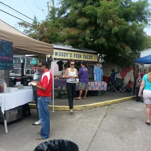 people shopping at stalls