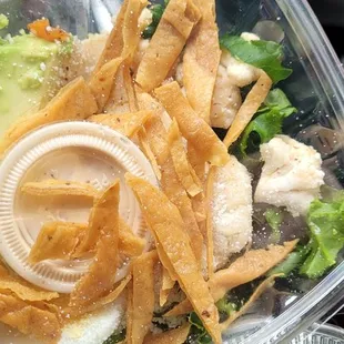 1/2 kale salad. Kale, cojita, avocado, escabeche, Boiled egg, tortilla strips &amp; Caesar dressing.