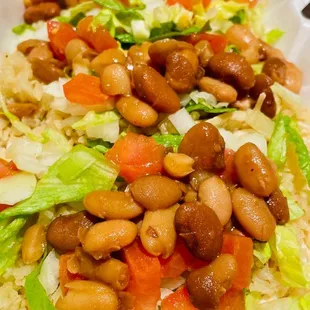 a salad with beans and lettuce