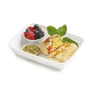 a burrito with fruit and salsa