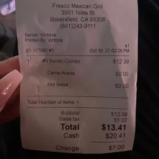 a person holding a receipt