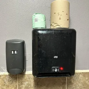 Broken paper towel dispenser in the only bathroom - going on 3 weeks now!