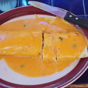 Taco Beef Burrito. No Lettuce. ( as requested). Rice. Beans. Taco Meat. Queso . Excellent!!!