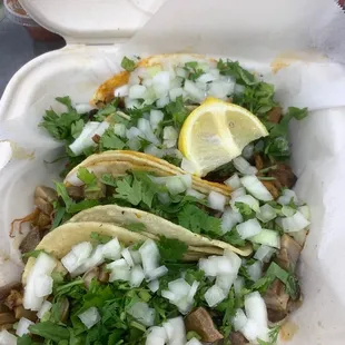 Al pastor tacos and lengua tacos- wish i could see the meat a bit.