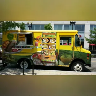 a food truck parked in front of a building