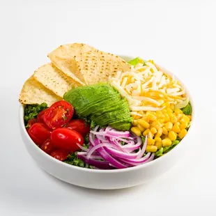 a salad in a white bowl