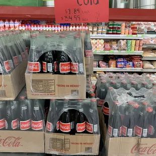 a display of coca cola bottles