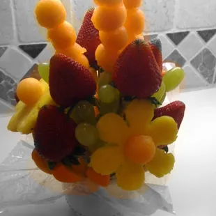 We do a variety of Fresh Fruit Arrangements, Candy Bouquets and Chocolate Covered Strawberries!