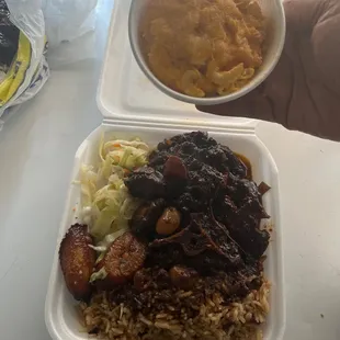 Oxtails , rice and peas, side Mac and cheese